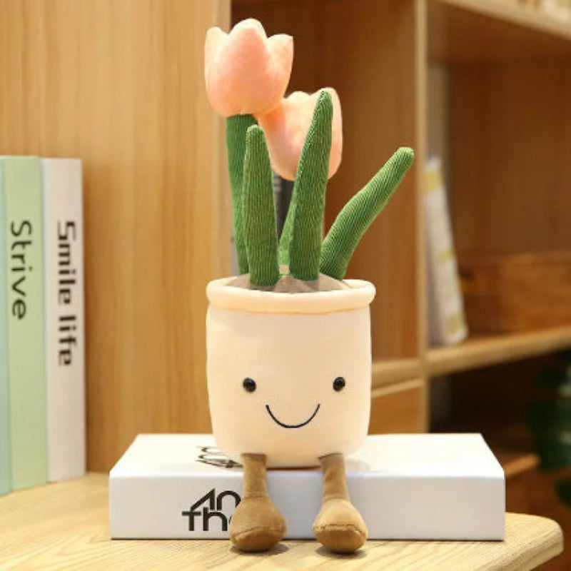 Plush toy pink plant with a smiling face.