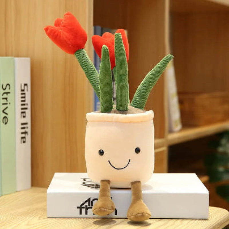Plush toy with a face and red flowers on a wooden surface
