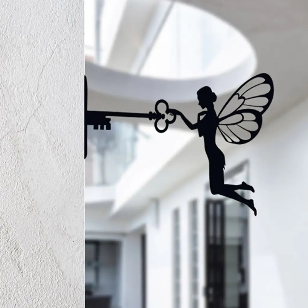 Enchanting Iron Fairy wall art for gardens, patios, or outdoor décor.