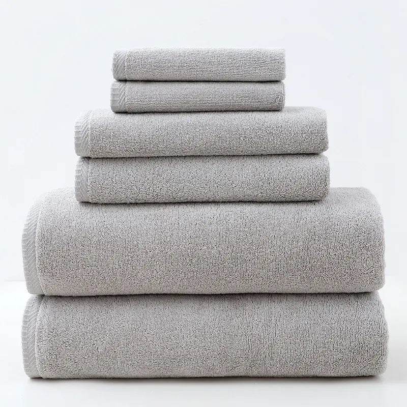 Stack of gray towels on a white background