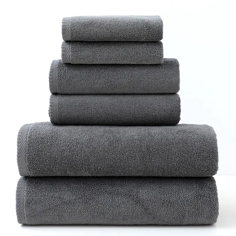 Stack of gray towels on a white background